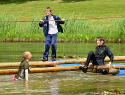 jumping into a river from the raft bridge
